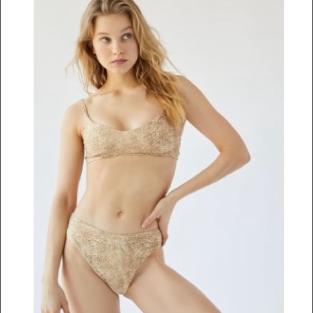 UO bikini set, top and bottom size medium, never worn,  tan animal print.